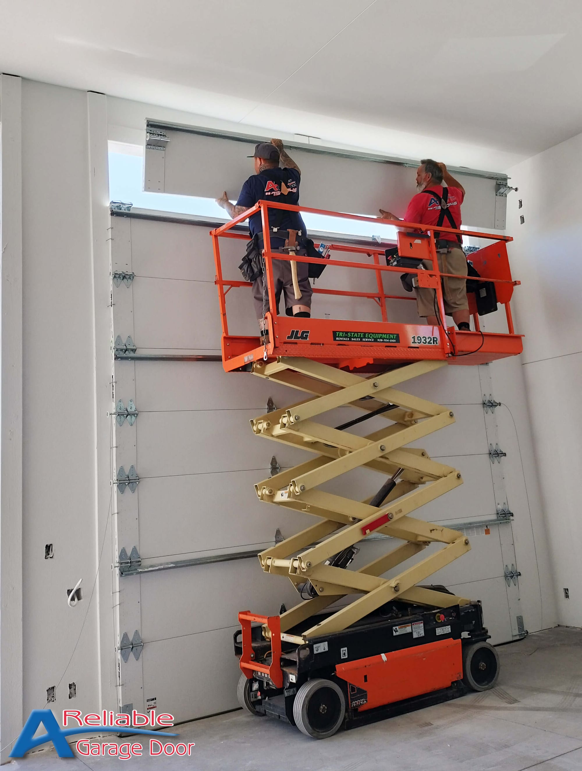 A Reliable Garage Door technicians replacing a snapped torsion spring in Lemon Grove